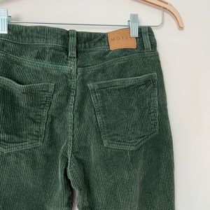 Green corduroy pants